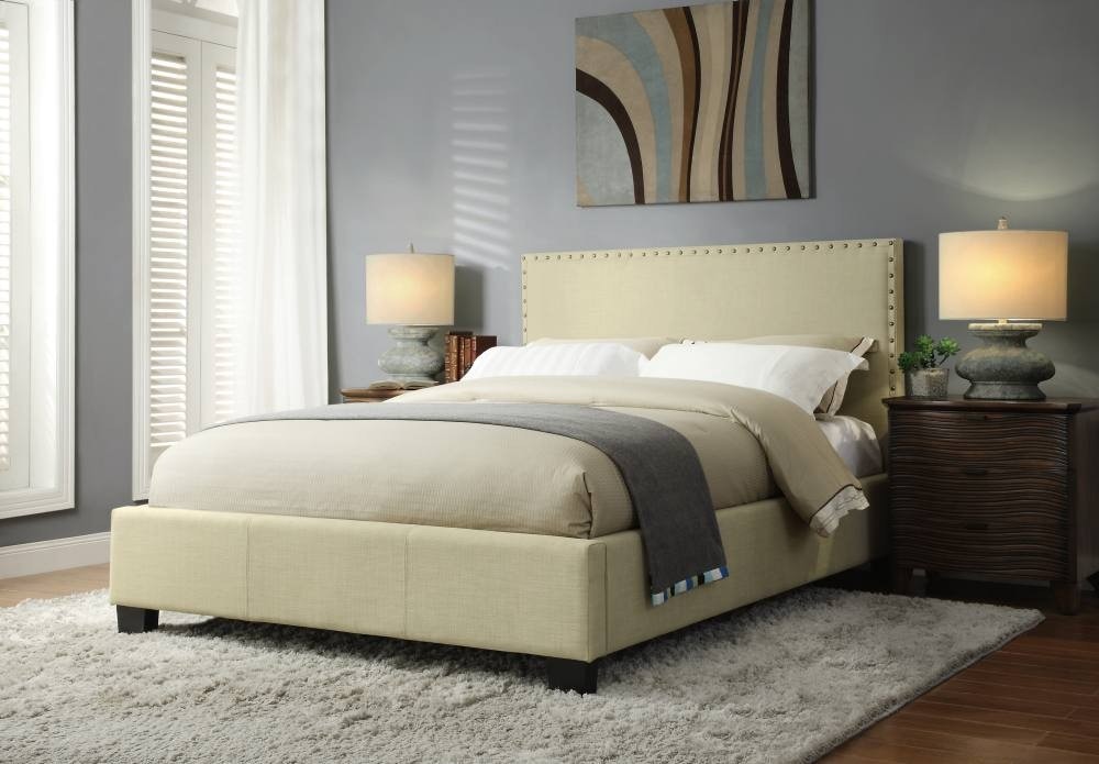 Upholstered nailhead outlet platform bed