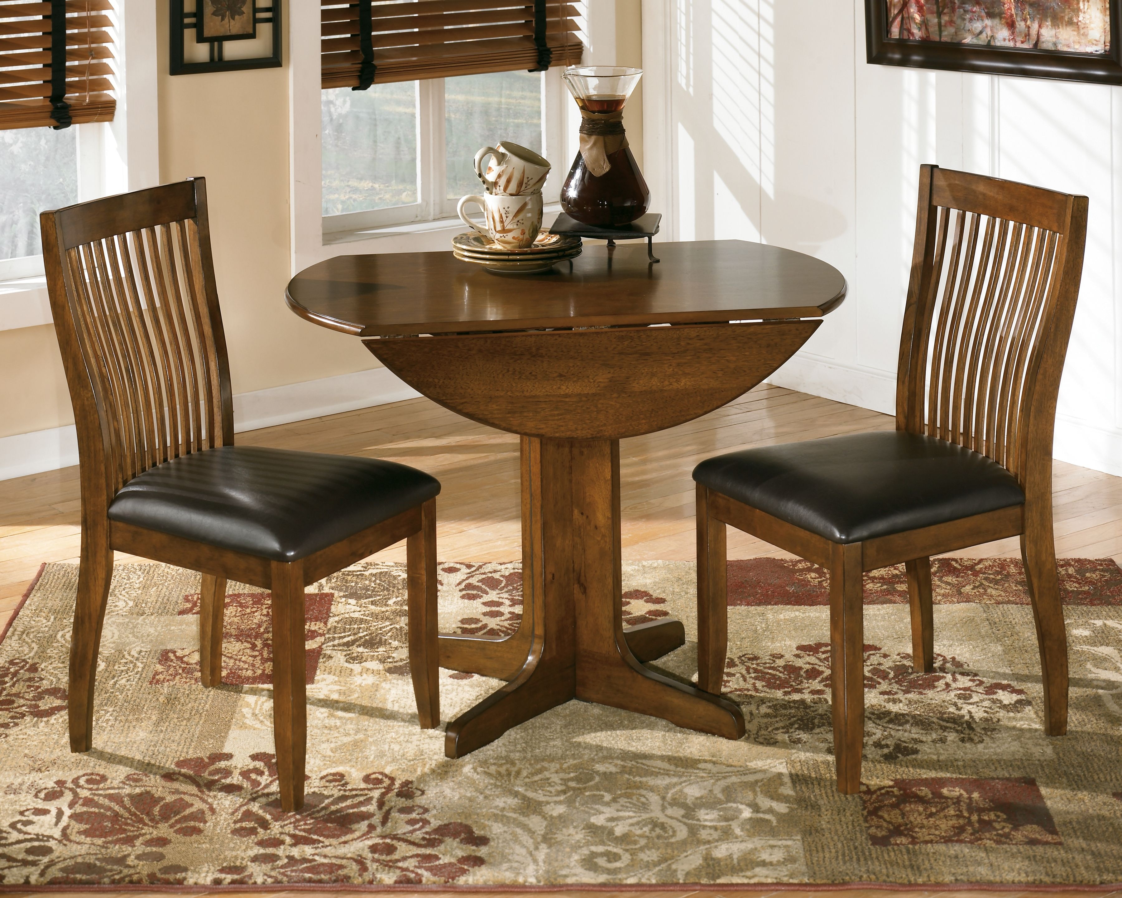 small drop leaf table and 2 chairs