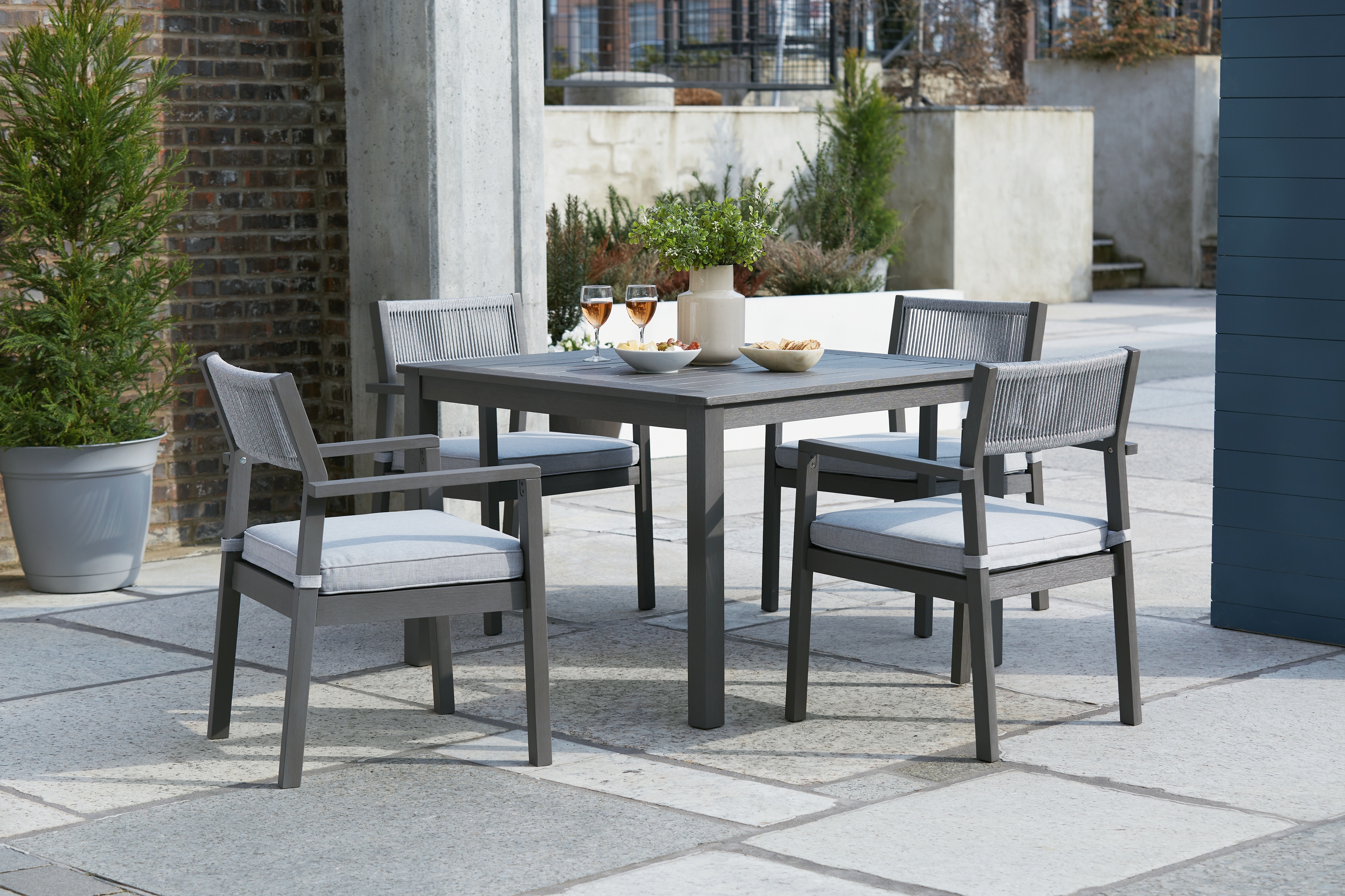 Signature Design by Ashley Outdoor Furniture 5Piece Outdoor Dining Package PKG013828 Hennen