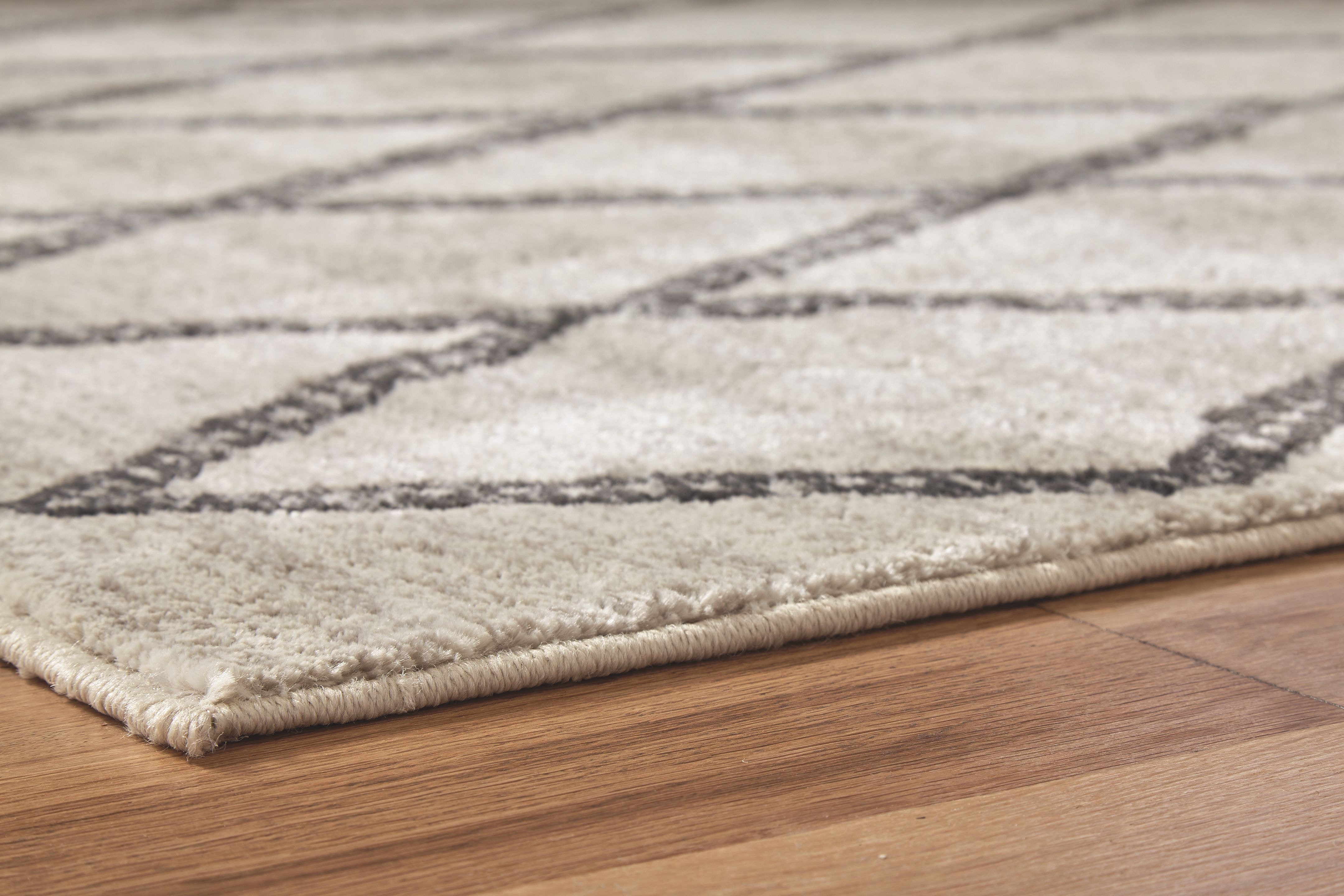 Signature Design by Ashley Area Rugs Jarmo 5' x 7' Rug R402622