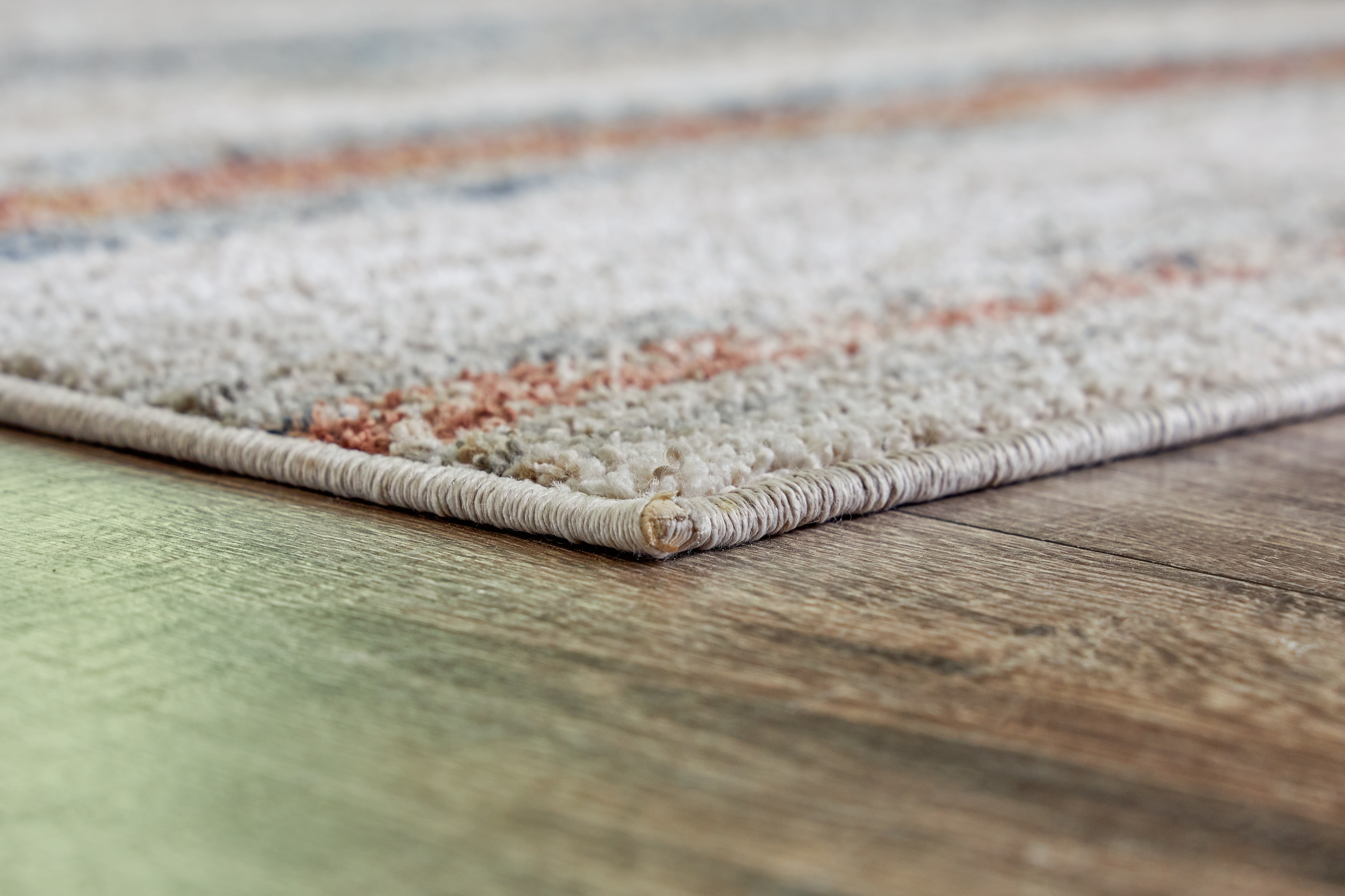 Signature Design by Ashley Area Rugs Kemart 5' x 7' Rug R406682