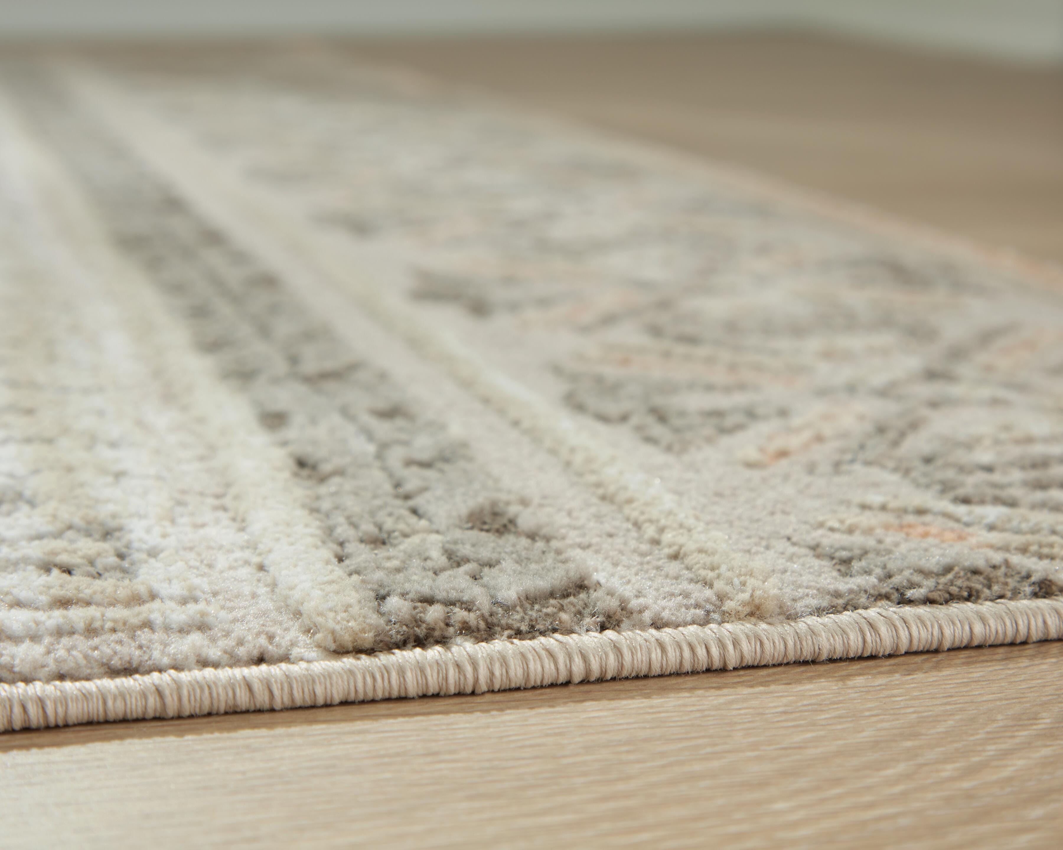 Signature Design by Ashley Area Rugs Bachby 7'10
