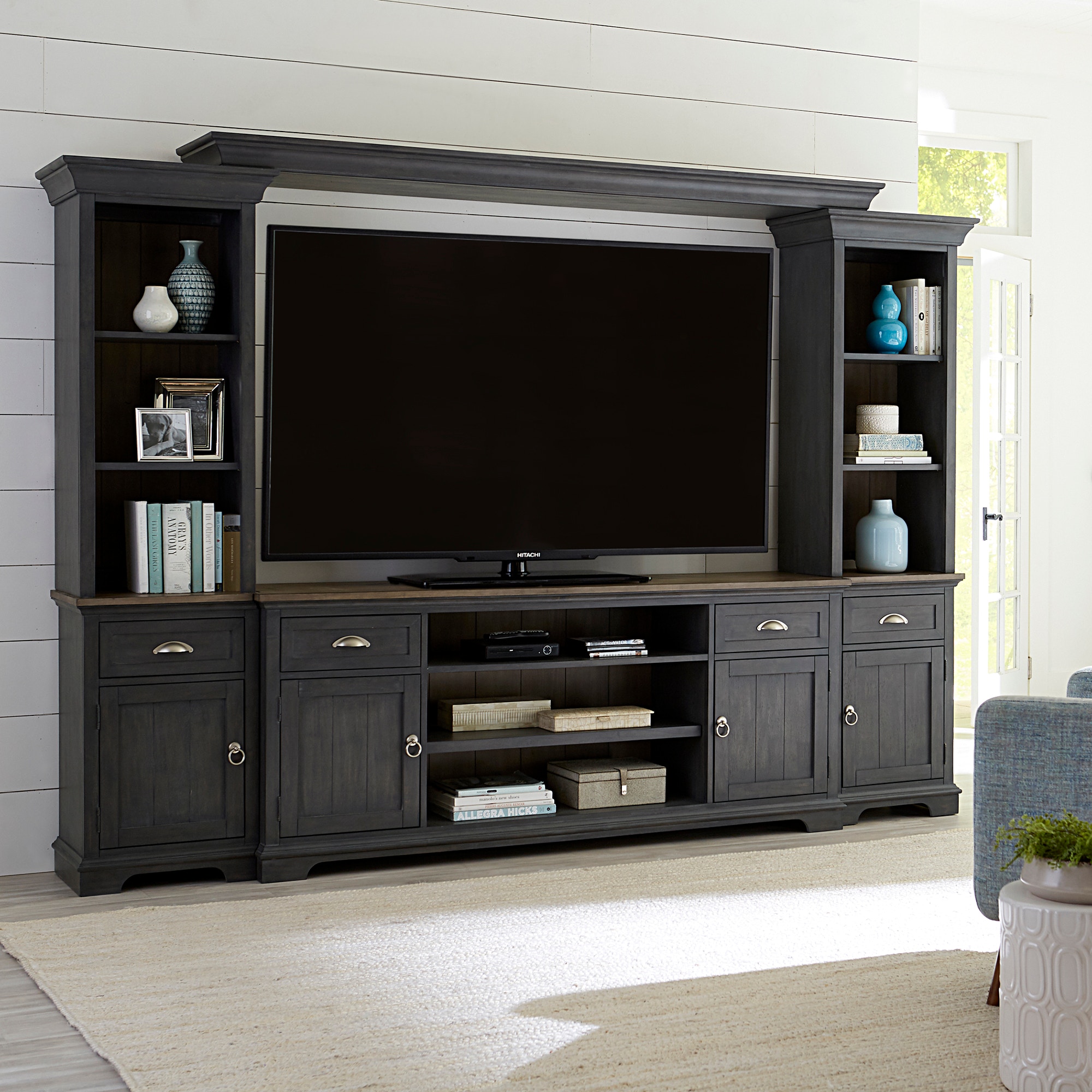 Entertainment center outlet with piers