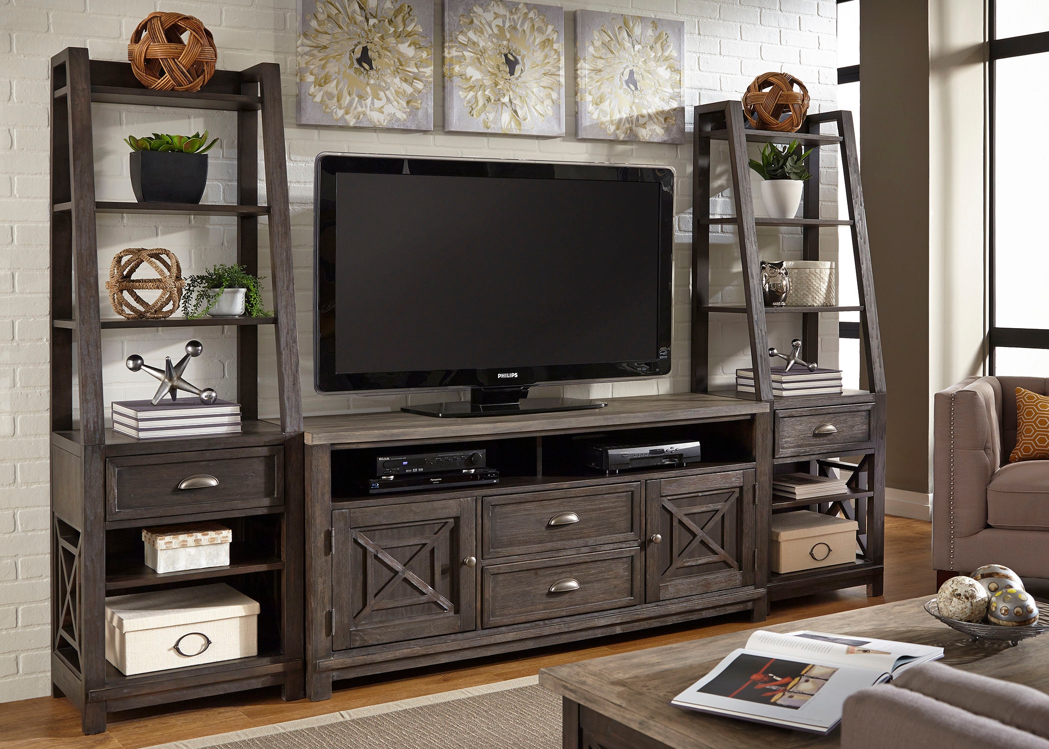 Entertainment center outlet with piers