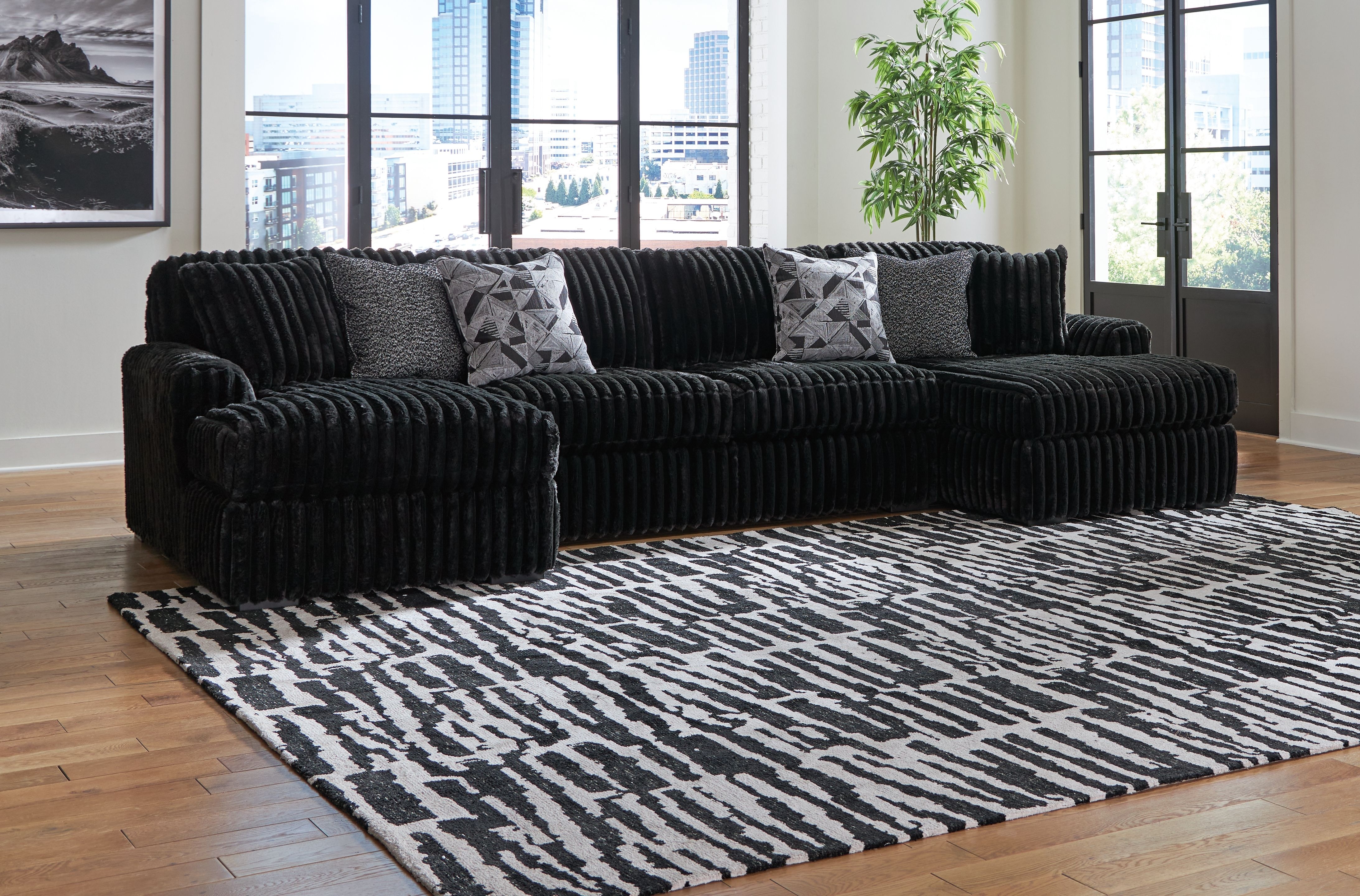 Ashley Midnight-Madness Sectional with Ottoman 98103-16-34-17-08