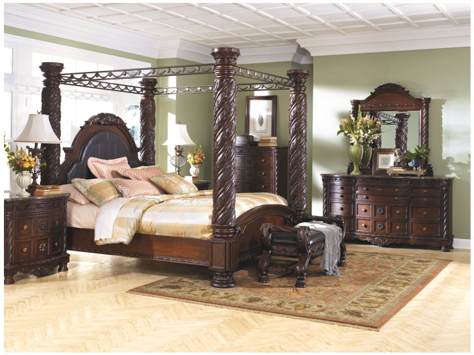 Royale poster canopy bedroom set deals with marble and leather accents