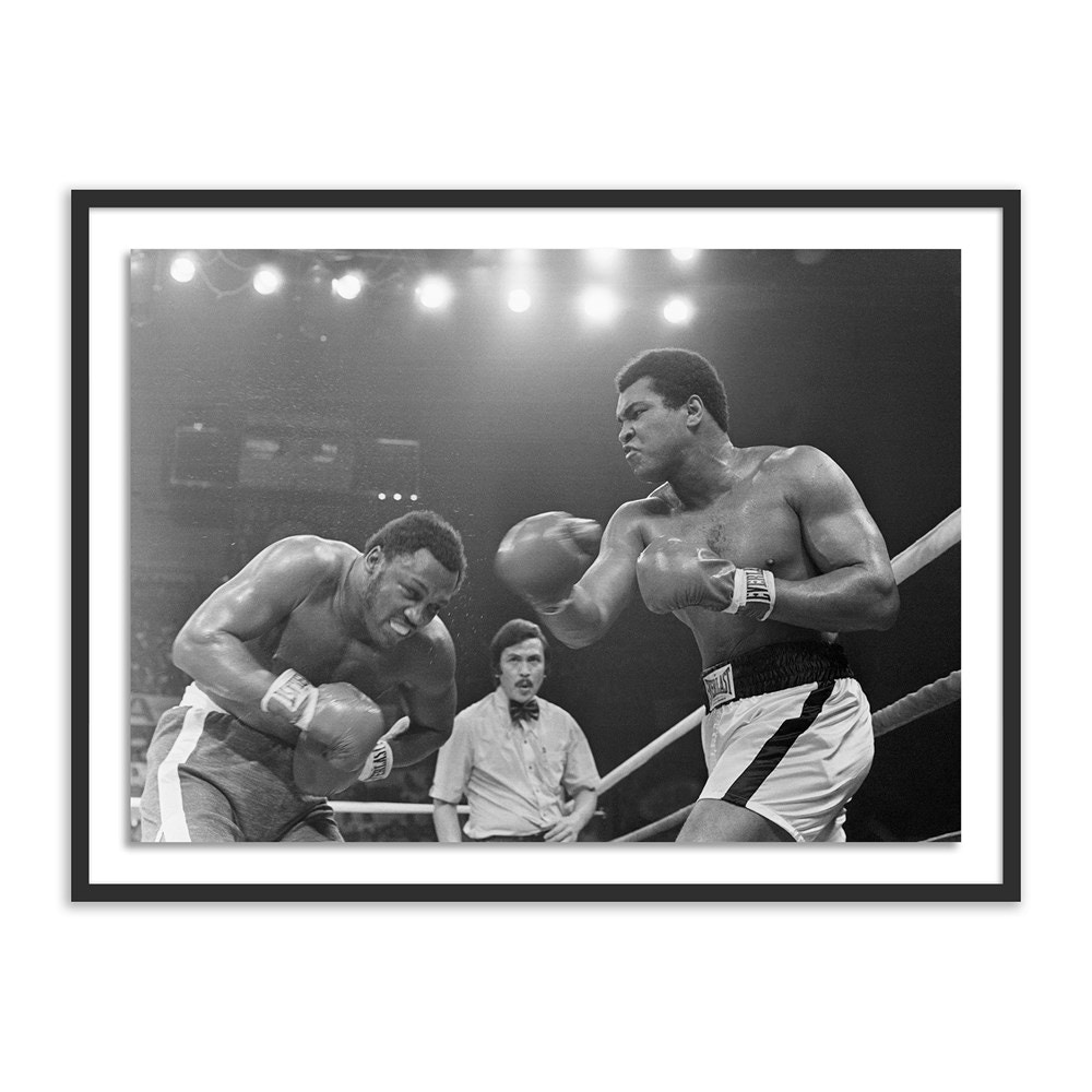 Four Hands Muhammad Ali Punching Joe Frazier By Getty Images