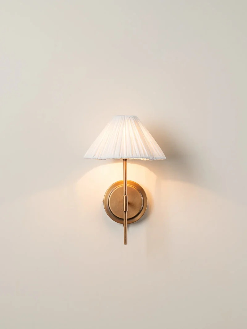  Lindi - aged brass and linen scalloped wall light 